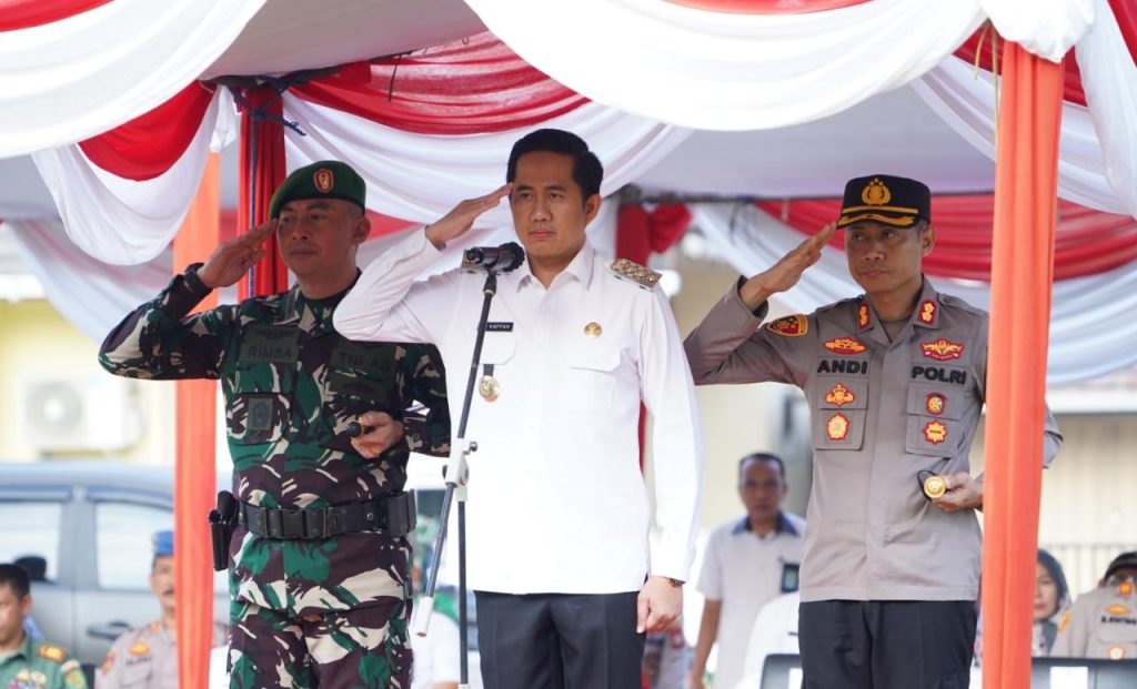 a2-1-1024x621 Jelang Pemilu, Plt Bupati Kaffah Pimpin Apel Serentak Kasat Kamling dan Apel Besar Polisi RW